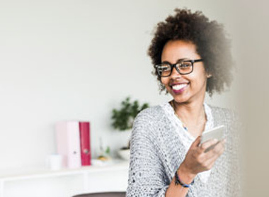 Woman smiling while looking to her left 