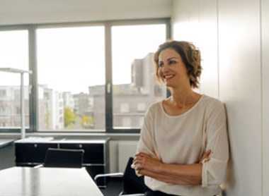 Woman at work looking happy without fade effect